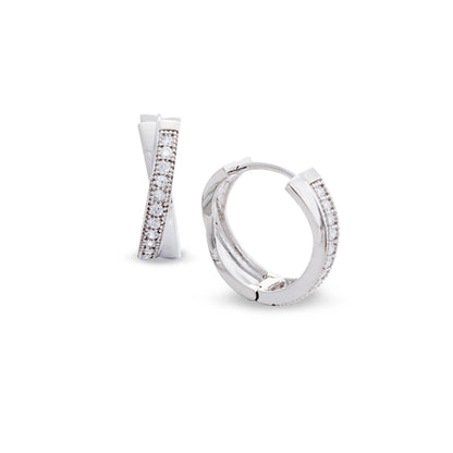 A criss cross huggie earrings with simulated diamonds displayed on a neutral white background.