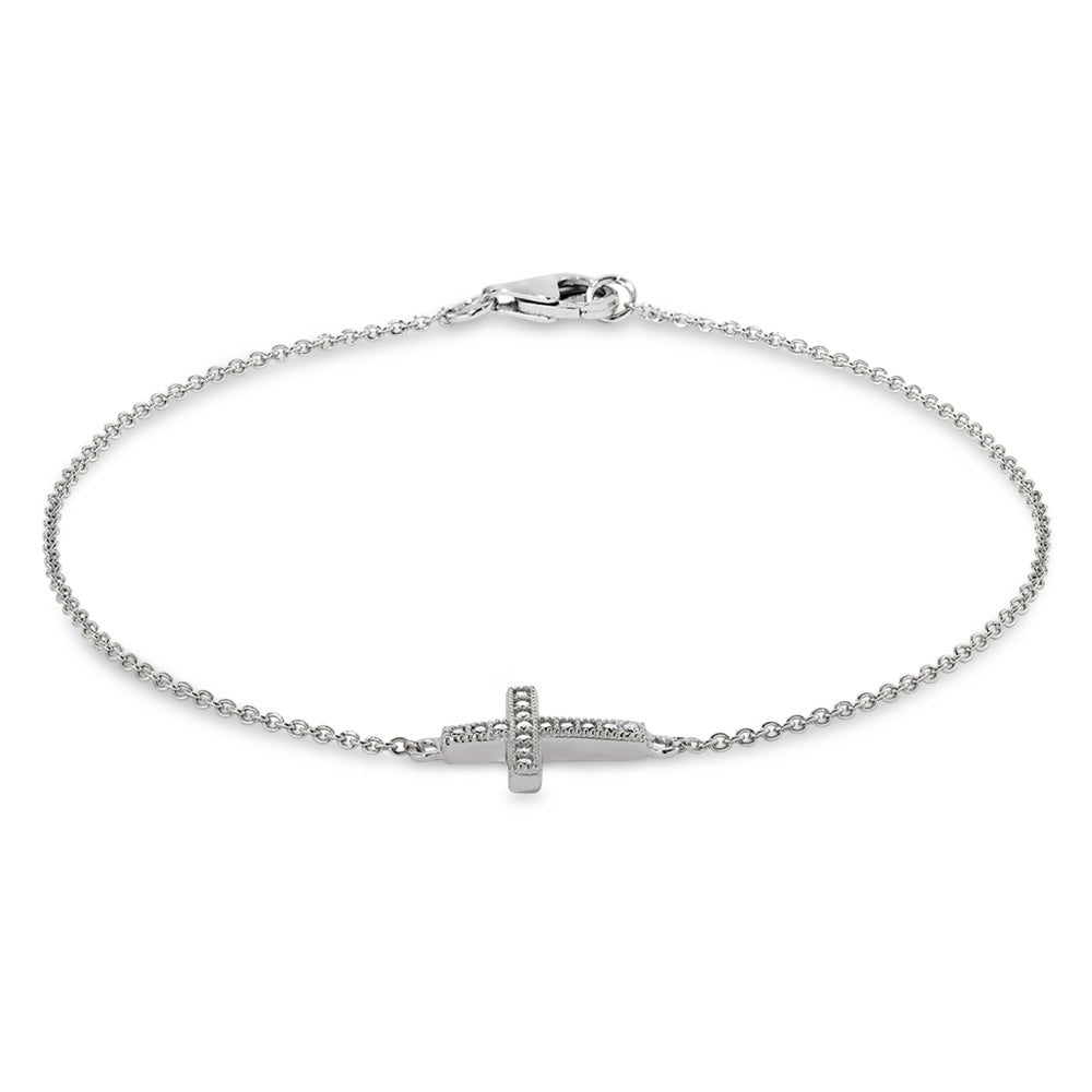 A cross adjustable bracelet with simulated diamonds displayed on a neutral white background.