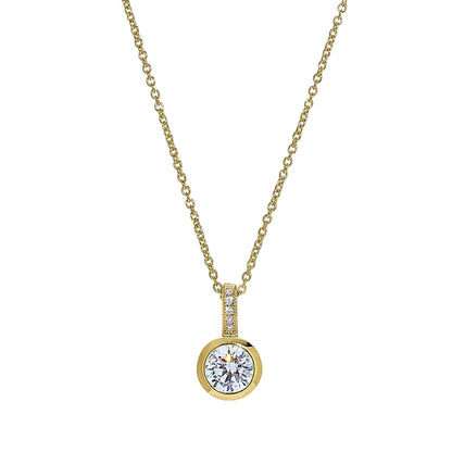 A drop bezel necklace with simulated diamonds displayed on a neutral white background.