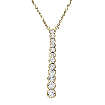 A drop necklace with simulated diamonds displayed on a neutral white background.