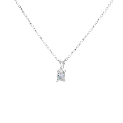 A emerald cut simulated diamond necklace displayed on a neutral white background.