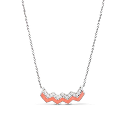 A enamel zig zag necklace with simulated diamonds displayed on a neutral white background.