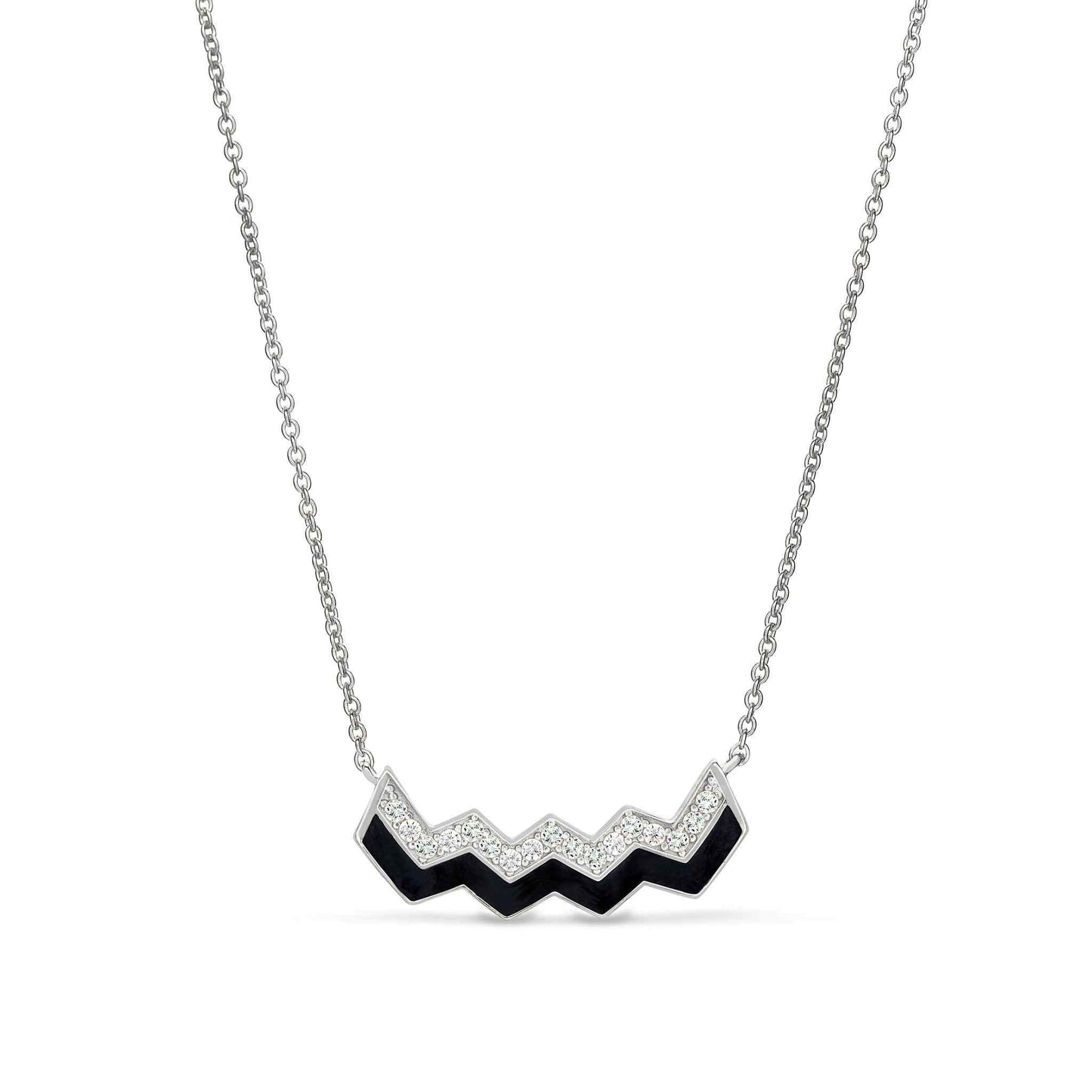 A enamel zig zag necklace with simulated diamonds displayed on a neutral white background.
