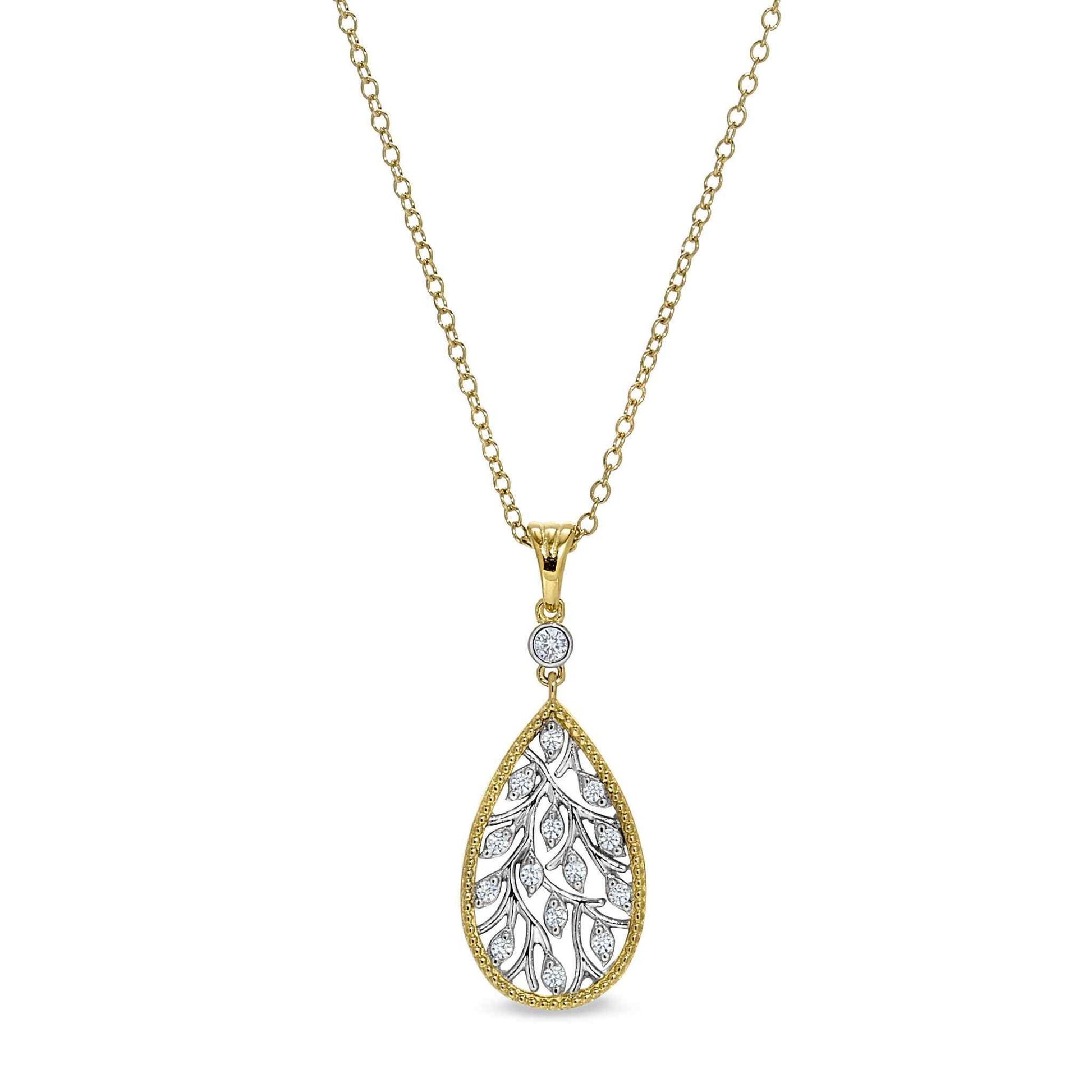 A gold and tear drop necklace with simulated diamonds displayed on a neutral white background.