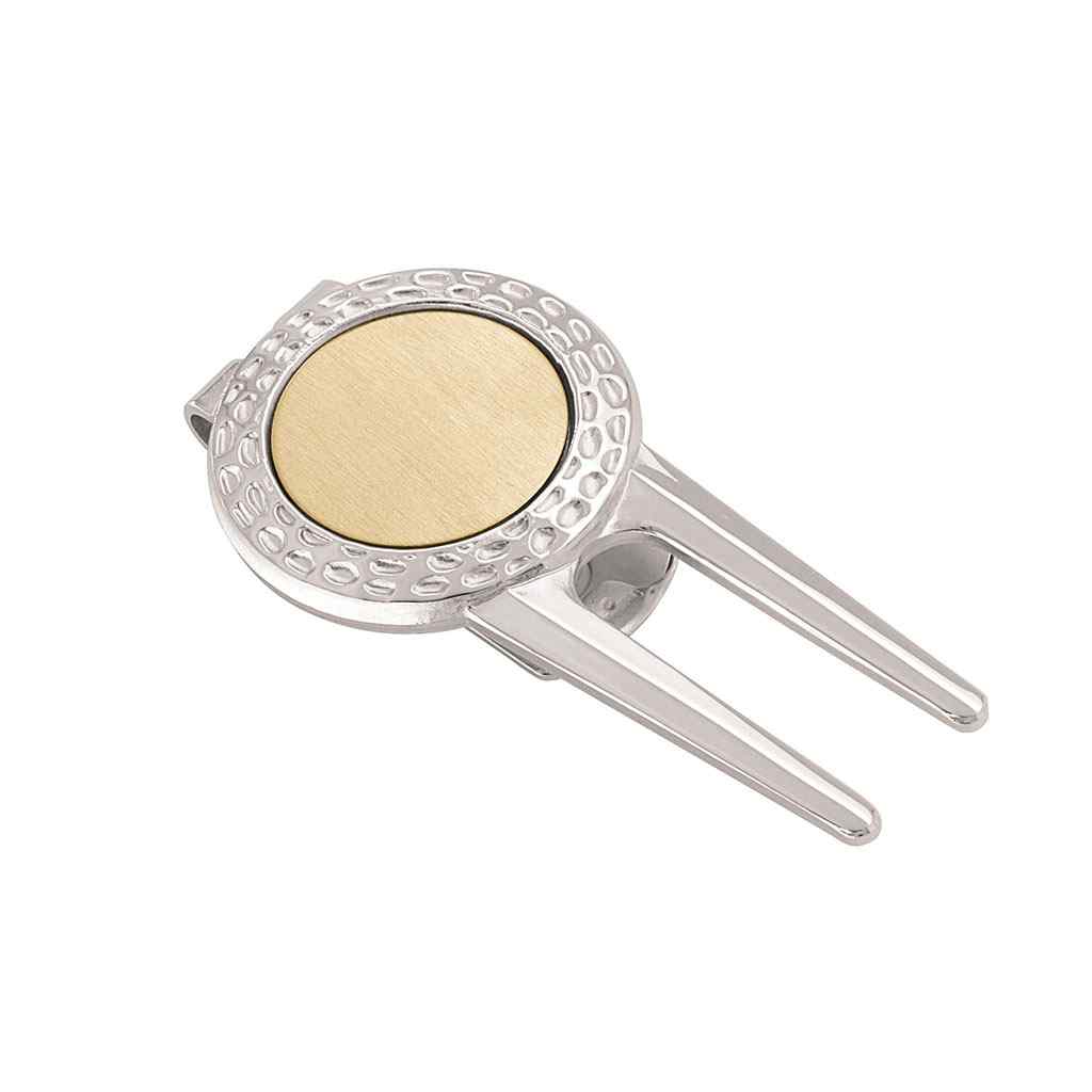 A golf divot repair tool money clip with ball marker displayed on a neutral white background.
