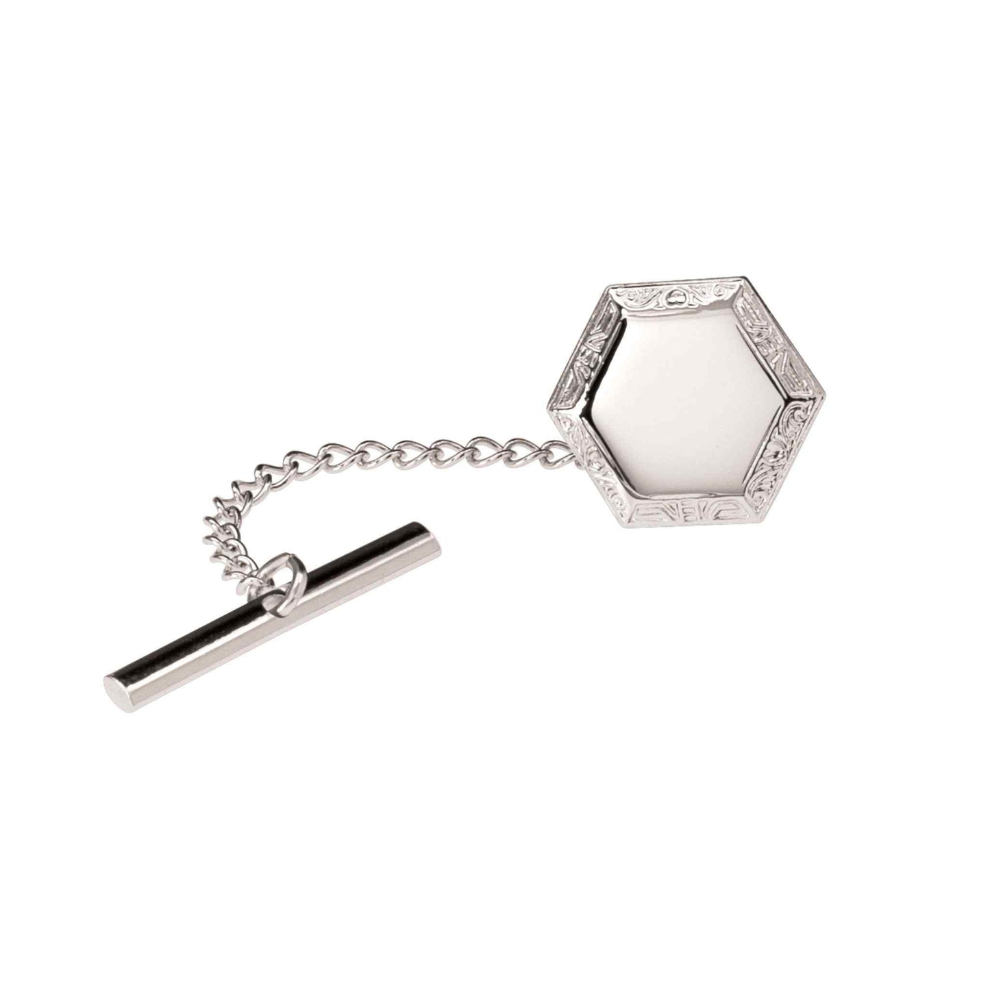 A hexagon tie tack with filigree edge displayed on a neutral white background.