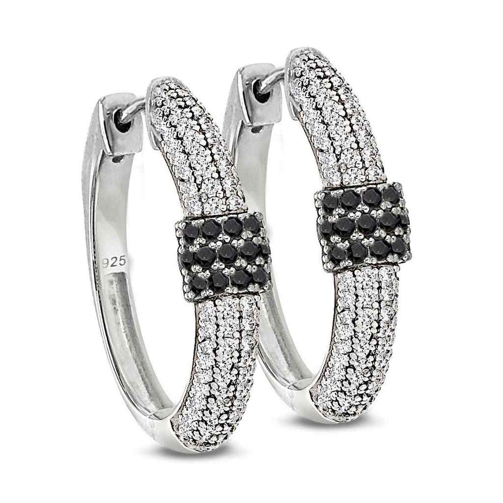 A hoop earrings with black & white simulated diamonds displayed on a neutral white background.