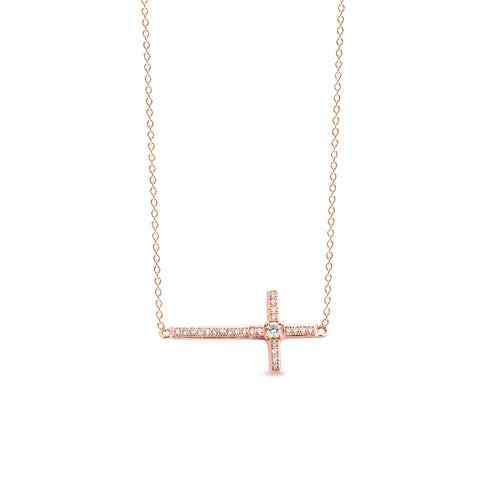 A horizontal cross necklace with simulated diamonds displayed on a neutral white background.