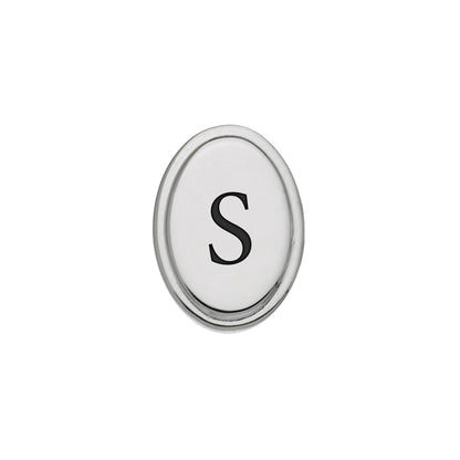 A black epoxy custom initial tie tack displayed on a neutral white background.
