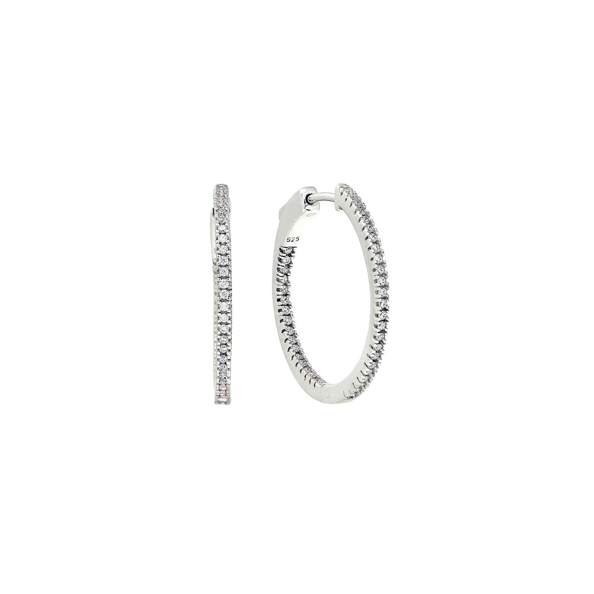 A inside out medium hoop earrings with simulated diamonds displayed on a neutral white background.