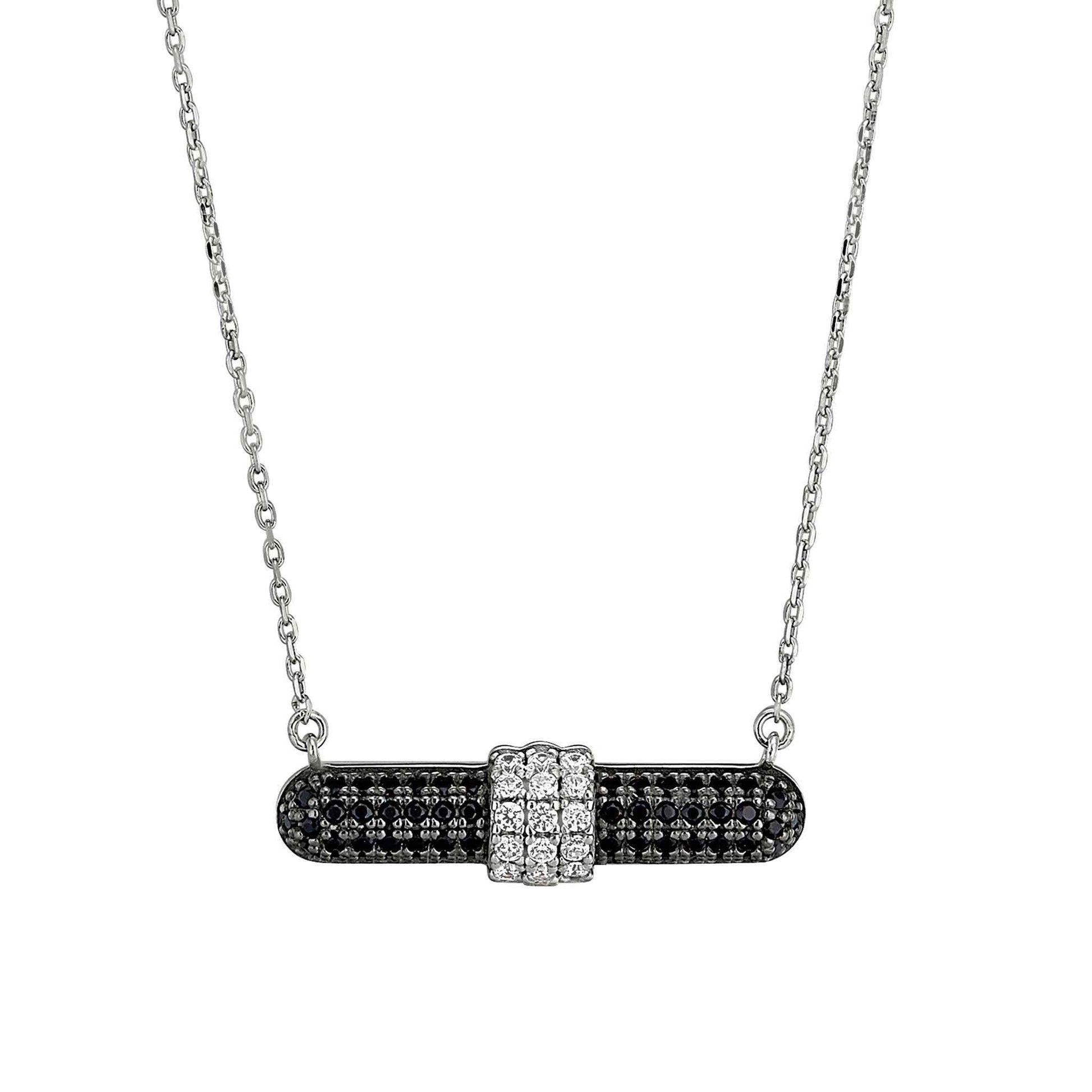 A necklace with black & white simulated diamonds displayed on a neutral white background.
