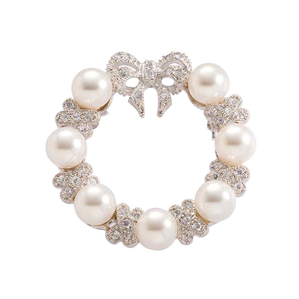 A ornate glass pearl wreath pin displayed on a neutral white background.