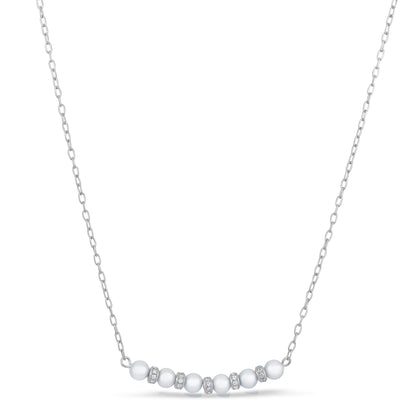 A pearl and simulated diamond necklace displayed on a neutral white background.
