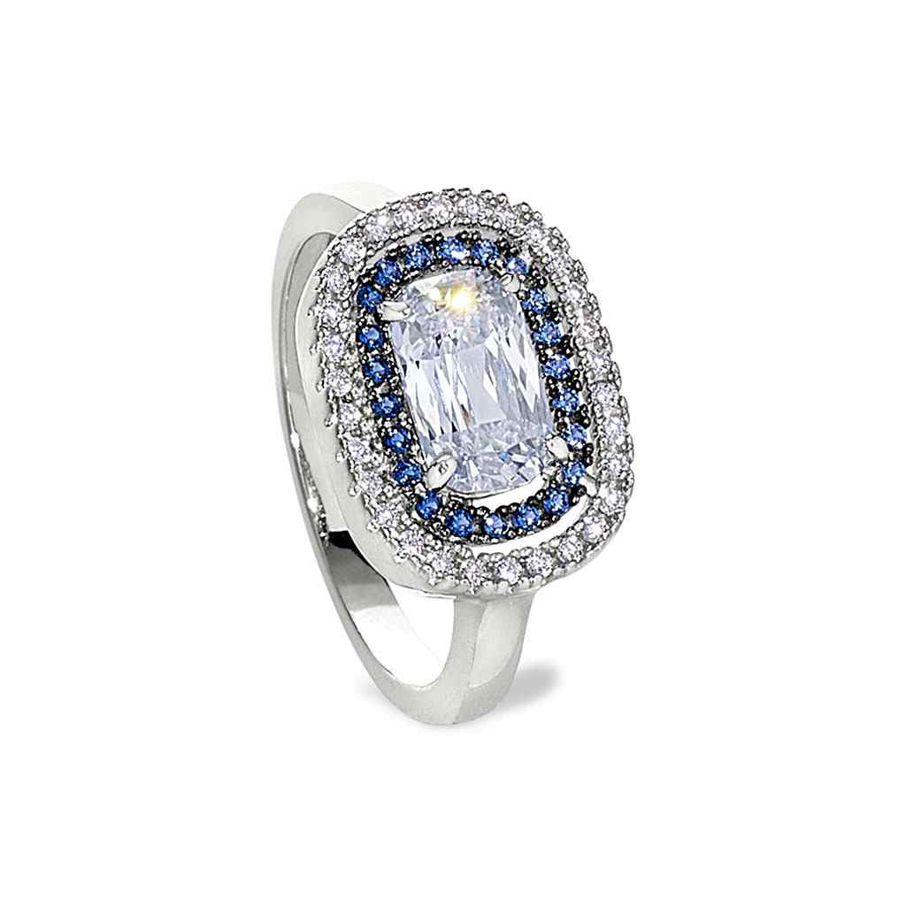 A platinum and black sterling silver ring with synthetic blue sapphire and hand set simulated diamonds displayed on a neutral white background.