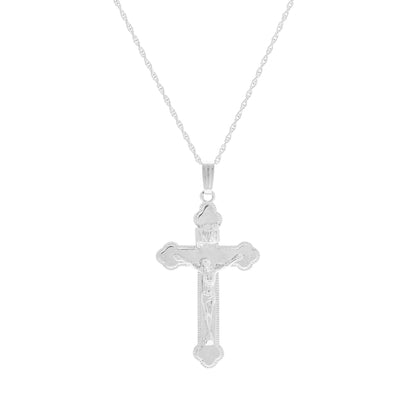 A polished crucifix necklace displayed on a neutral white background.