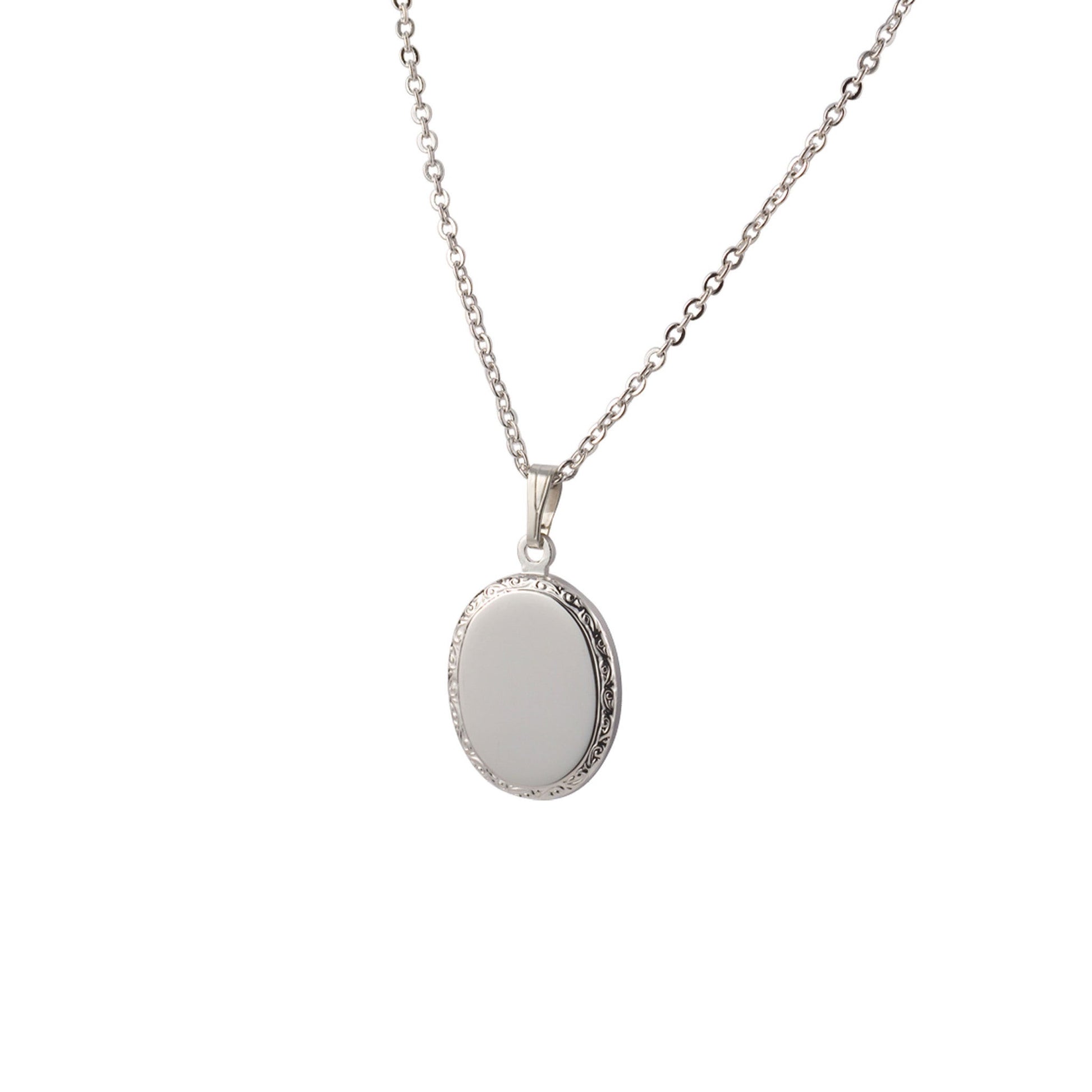A polished oval filigree necklace displayed on a neutral white background.