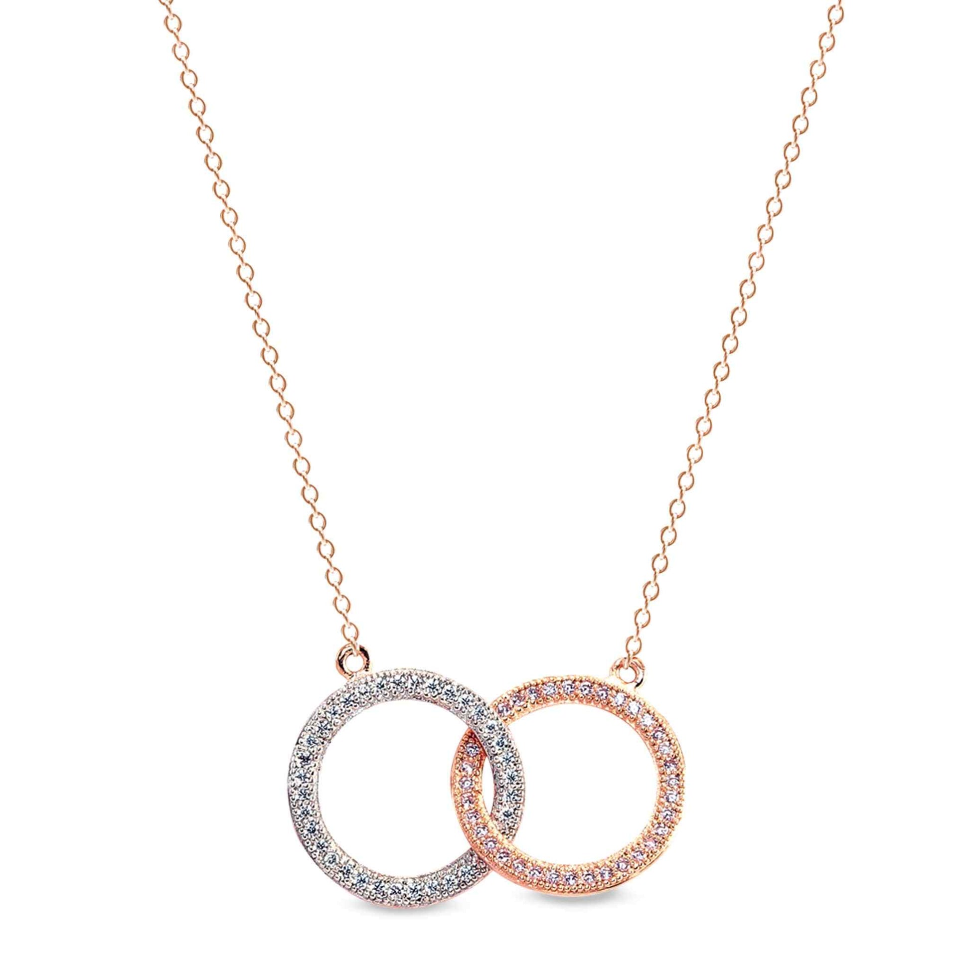 A rose gold and intertwined circles necklace with simulated diamonds displayed on a neutral white background.