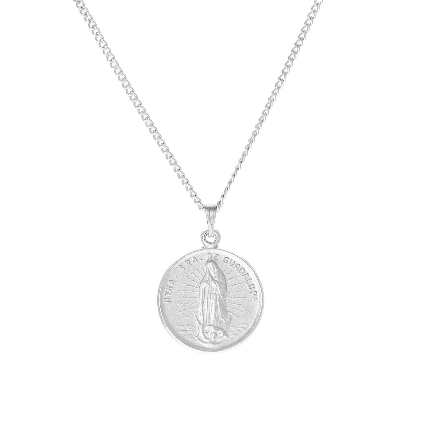 A round our lady of guadalupe medal displayed on a neutral white background.