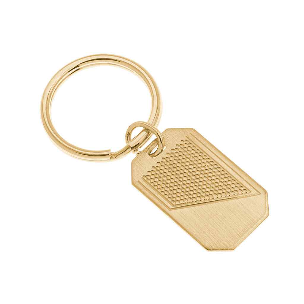 A satin finish honeycomb key ring displayed on a neutral white background.