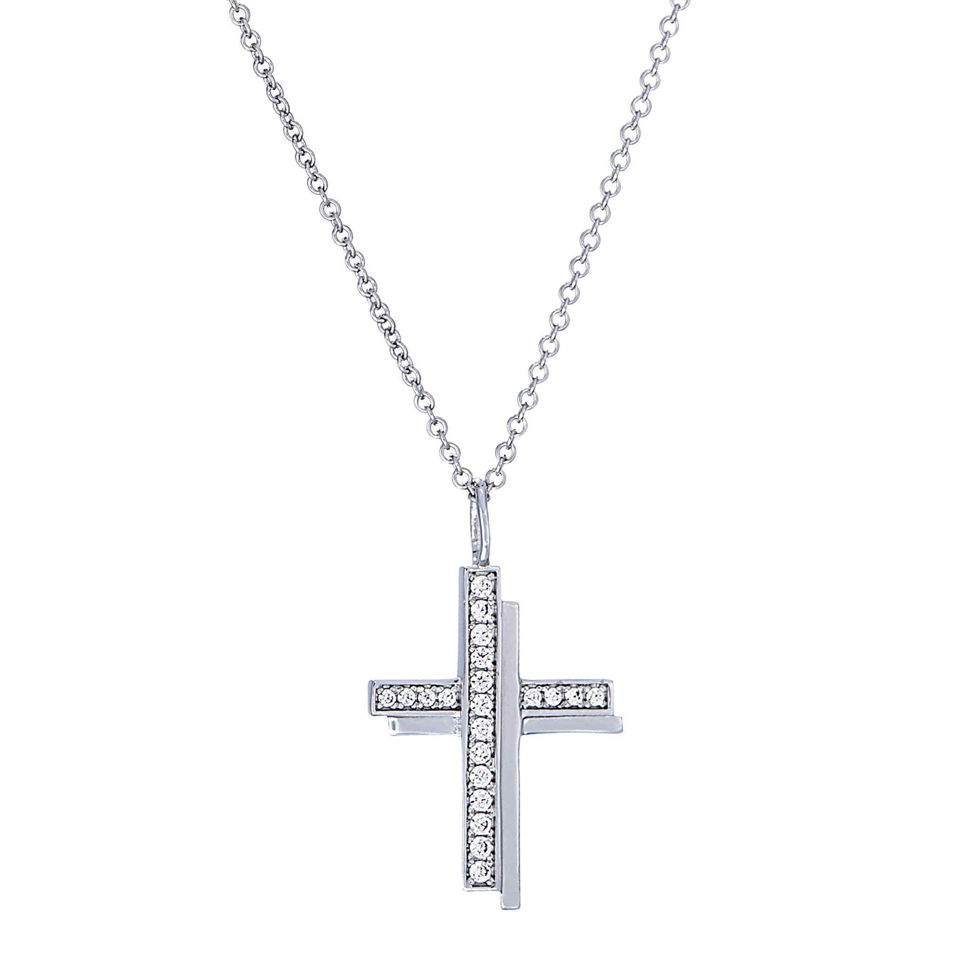 A shadow cross necklace with simulated diamonds displayed on a neutral white background.