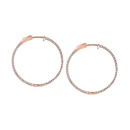 A side stone large hoop earrings with simulated diamonds displayed on a neutral white background.
