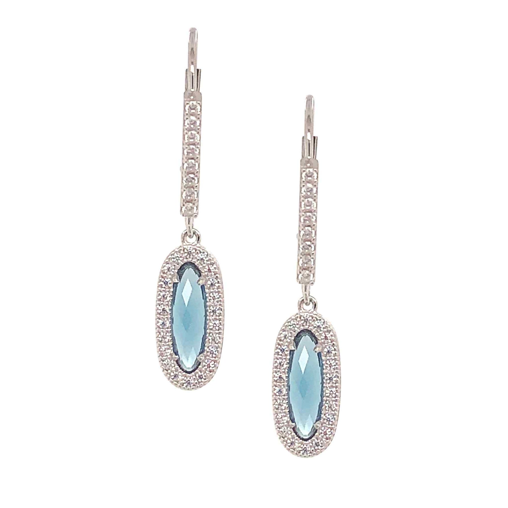 A simulated blue topaz & diamonds oblong earrings displayed on a neutral white background.