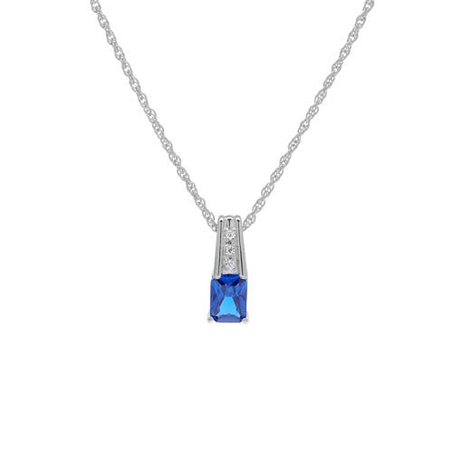A simulated sapphire & diamond necklace displayed on a neutral white background.