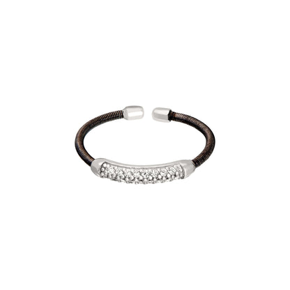 A flexible cable ring with simulated diamonds displayed on a neutral white background.