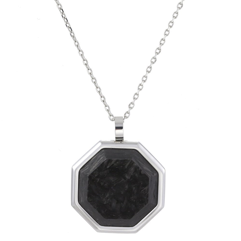 A stainless steel forged carbon octagon pendant on chain displayed on a neutral white background.