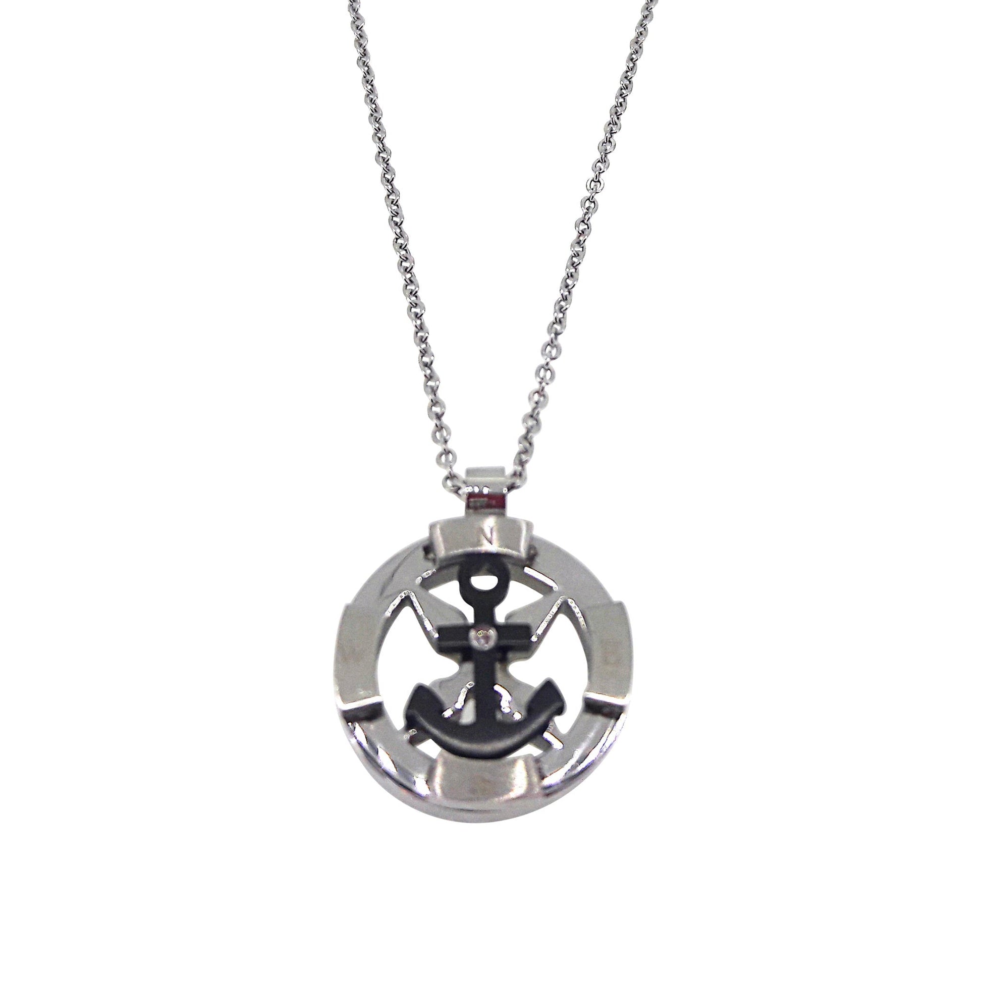 A stainless steel nautical compass and black anchor with simulated diamond on chain displayed on a neutral white background.