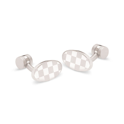 A stainless steel oval checkerboard cufflinks displayed on a neutral white background.