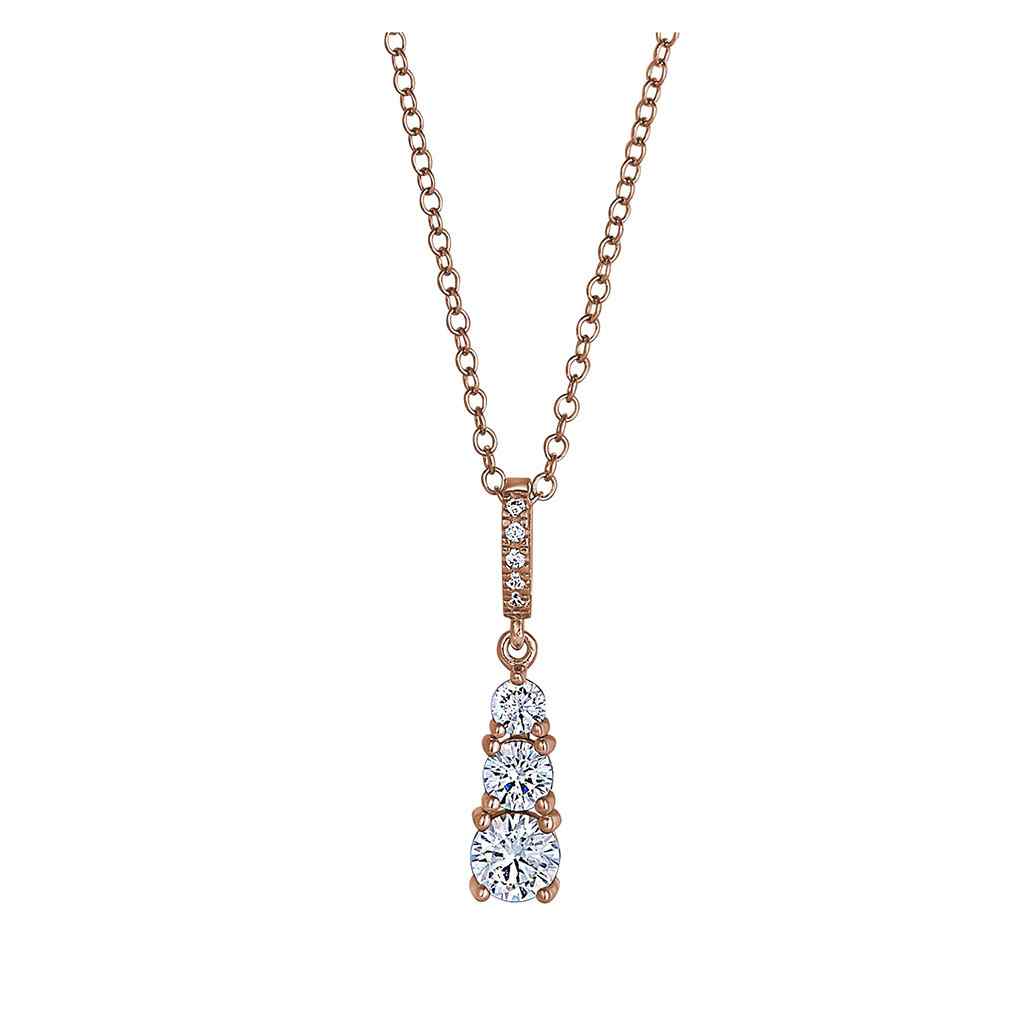A sterling silver three stone drop necklace with simulated diamonds displayed on a neutral white background.