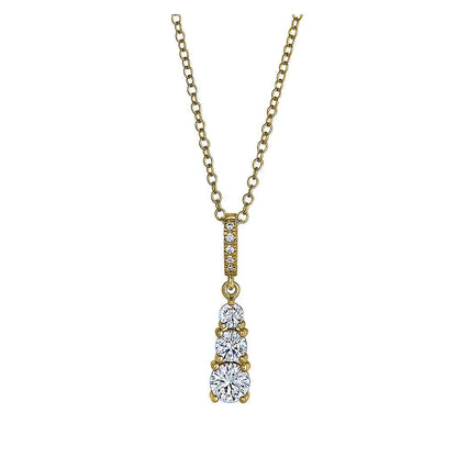 A sterling silver three stone drop necklace with simulated diamonds displayed on a neutral white background.
