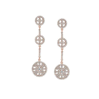 A three circle drop earrings with simulated diamonds displayed on a neutral white background.