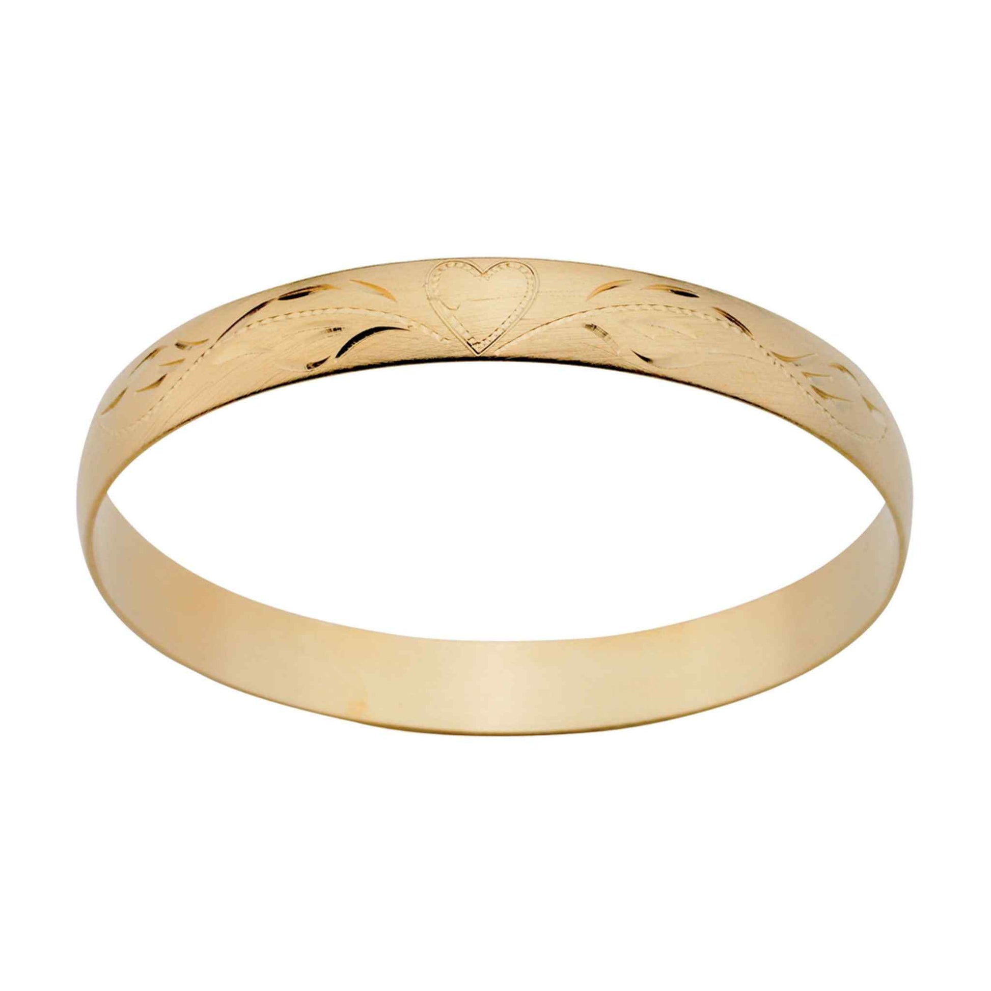 A 3/8" bangle bracelet with hand engraving displayed on a neutral white background.