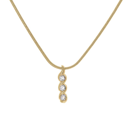 A three stone swirl necklace displayed on a neutral white background.