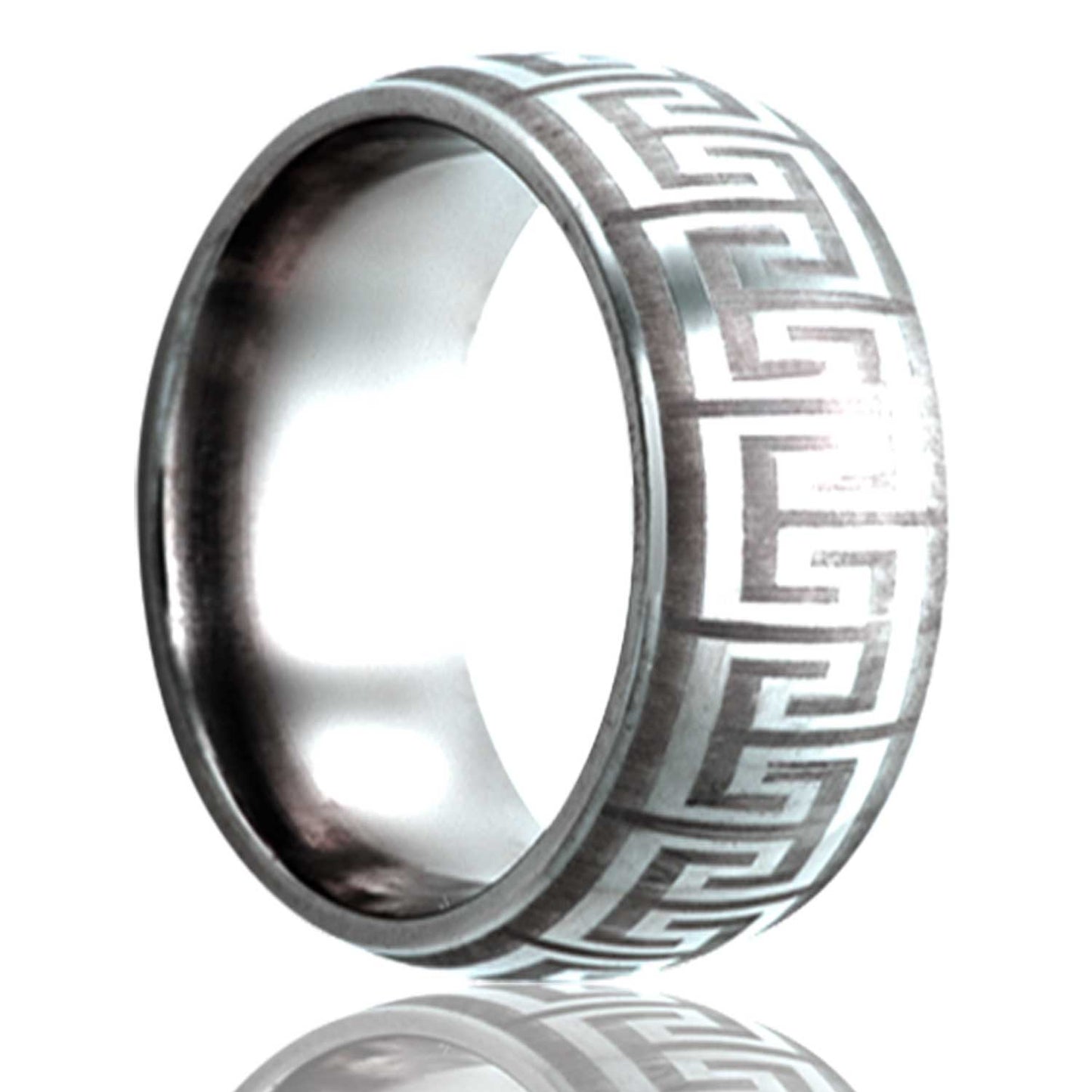 A greek key domed engraved titanium wedding band displayed on a neutral white background.