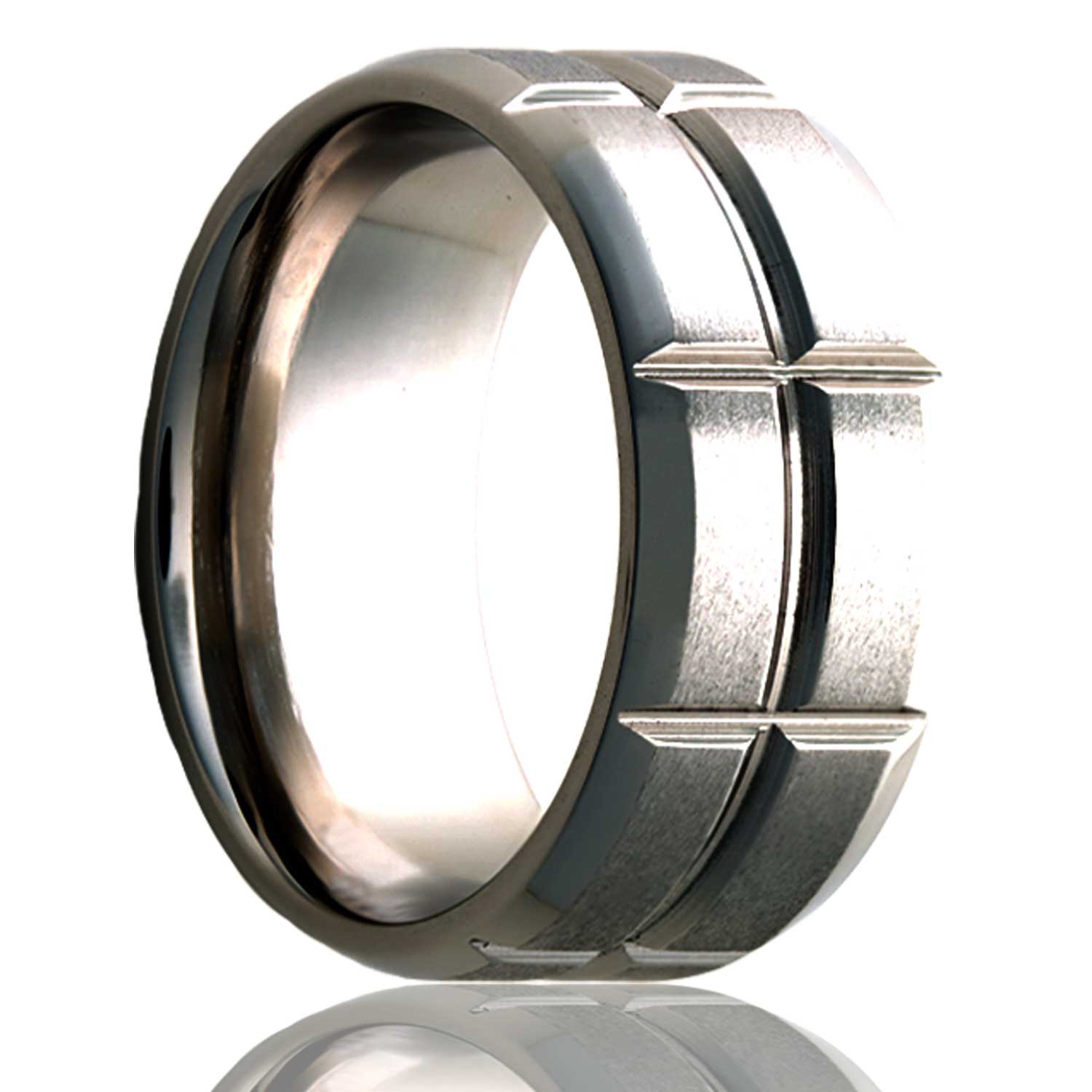 A satin finish titanium wedding band with beveled edges with intersecting grooves displayed on a neutral white background.