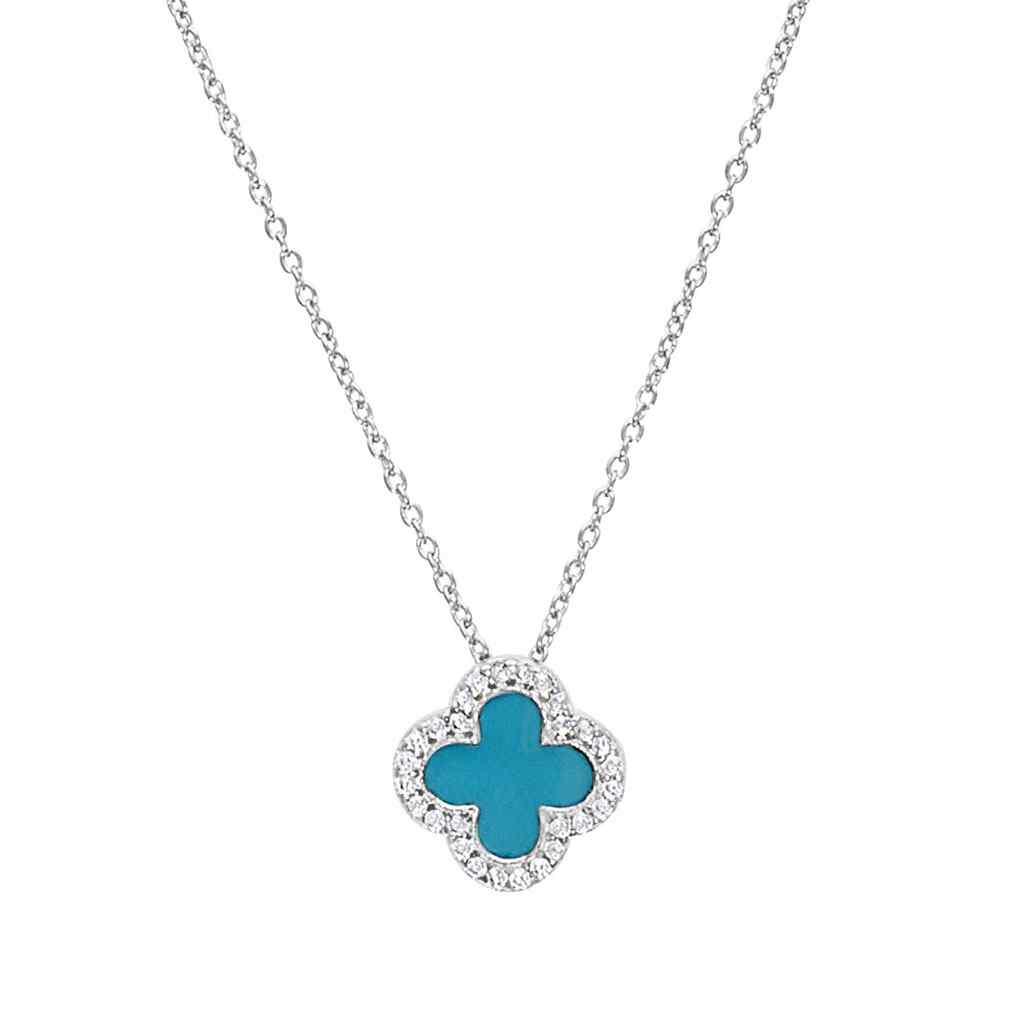 A turquoise enamel clover necklace with simulated diamonds displayed on a neutral white background.