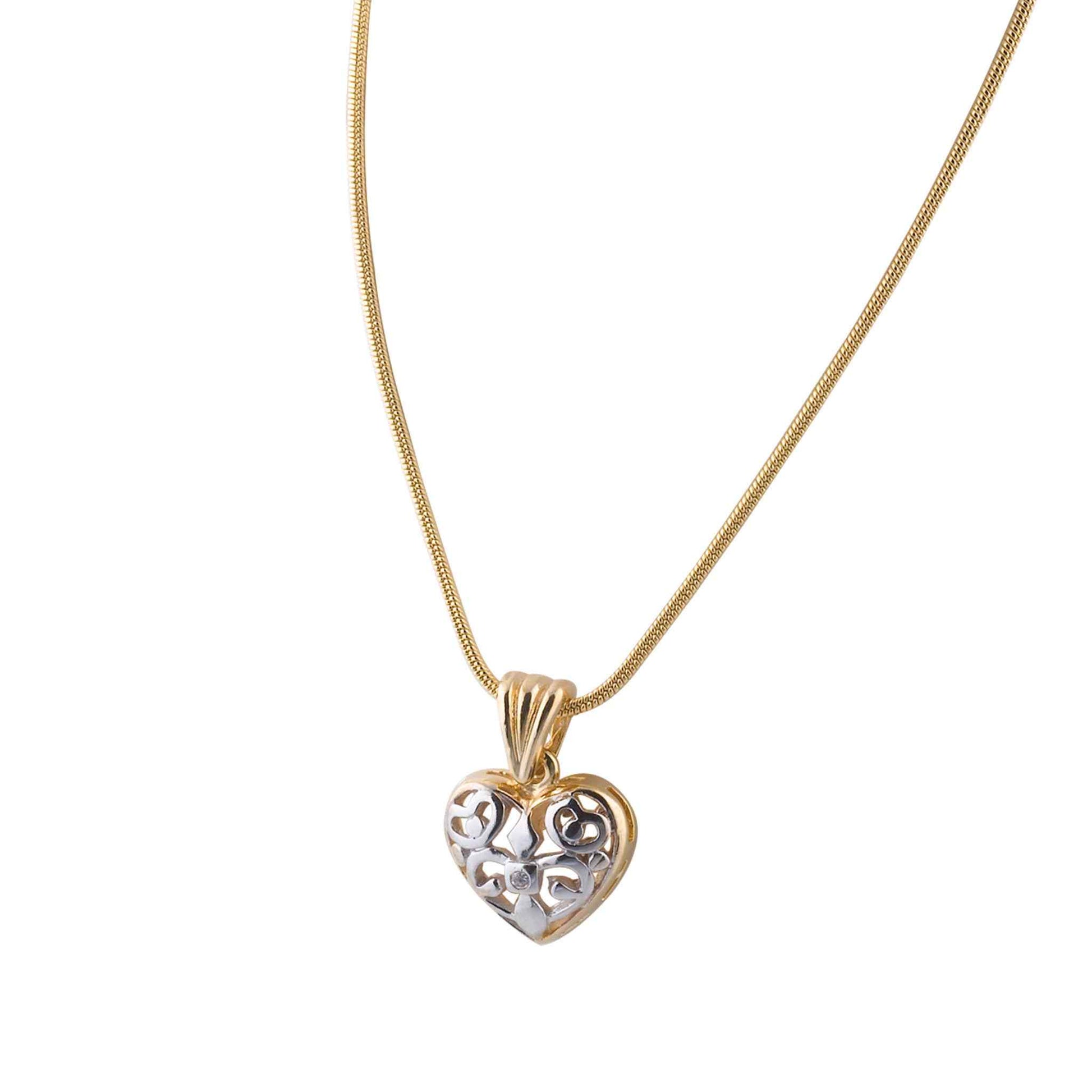 A two tone gold & rhodium filigree heart pendant displayed on a neutral white background.