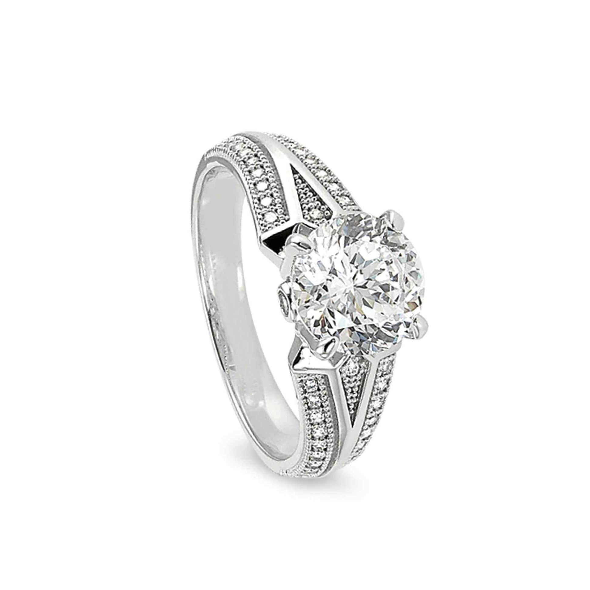 A v shaped band engagement ring with 100 facet simulated diamond displayed on a neutral white background.