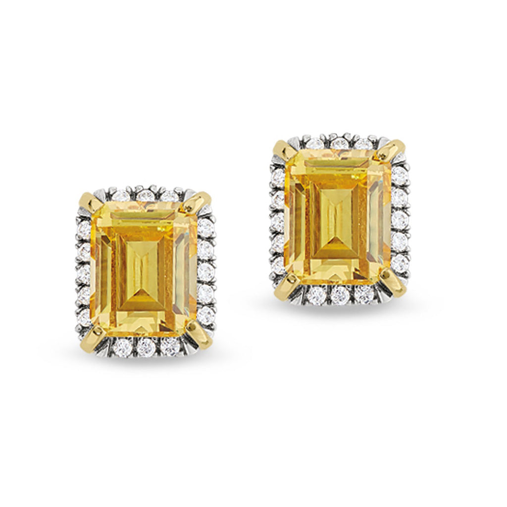 A vintage-style earrings with emerald cut canary stone & simulated diamonds displayed on a neutral white background.