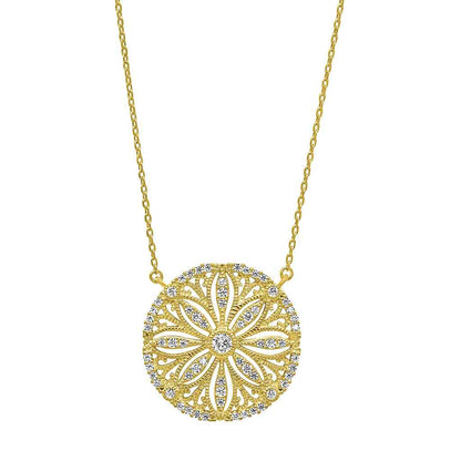 A vintage-style sand dollar necklace with simulated diamonds displayed on a neutral white background.